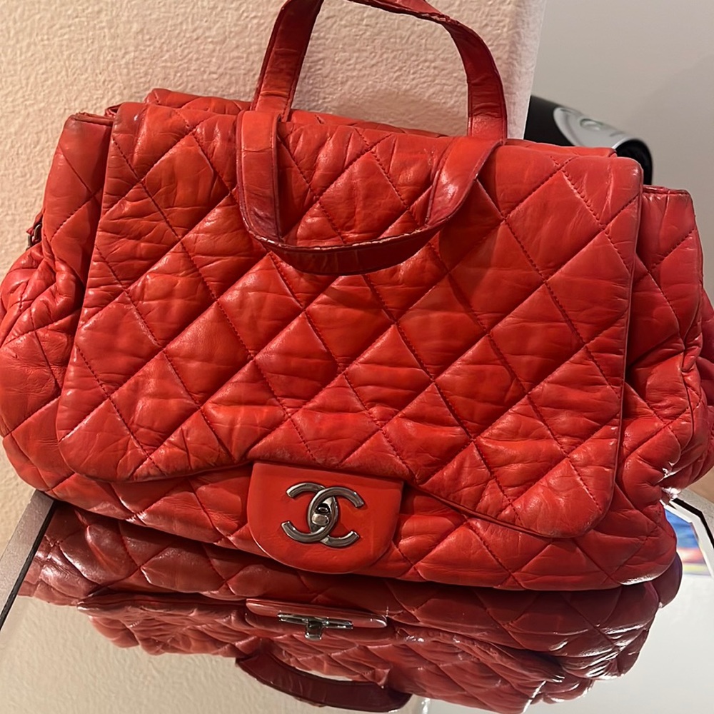 Chanel red lambskin chain shoulder bag with handle.